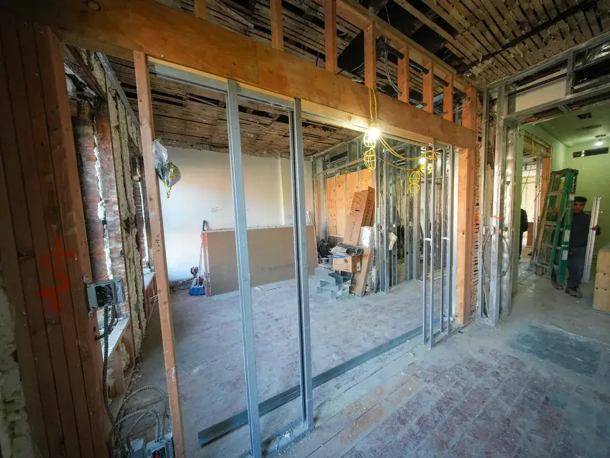 IWD Miami estimator performing on-site assessment for framing services project