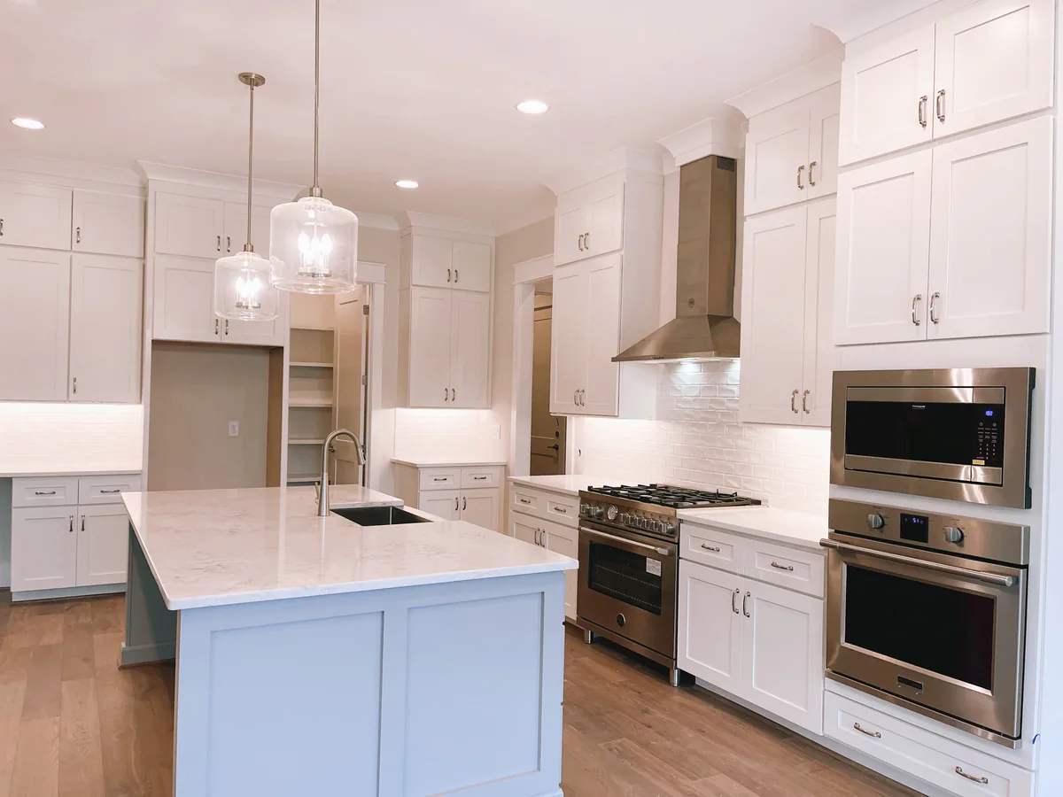 IWD Miami estimator performing on-site assessment for kitchen cabinets project