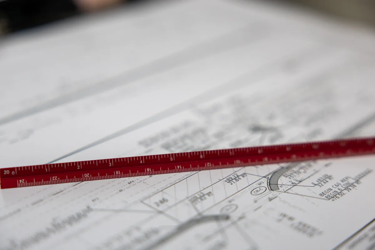 ACCA Manual J load calculation worksheet over architectural floor plan
