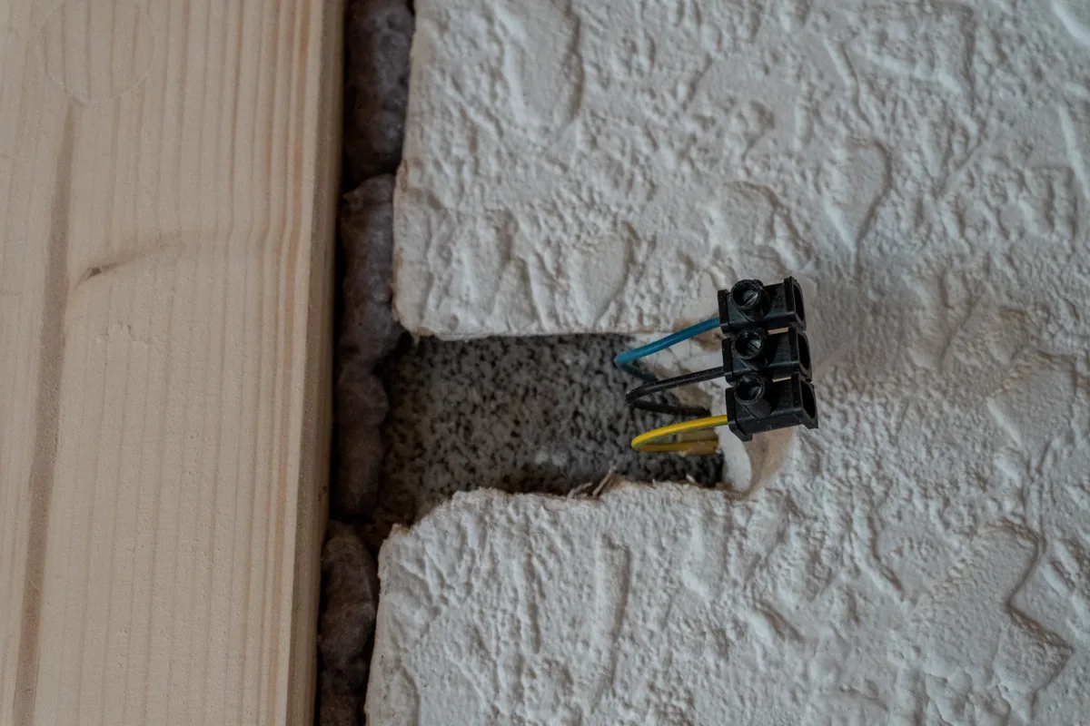 IWD Miami estimator performing on-site assessment for radiant floor heating project