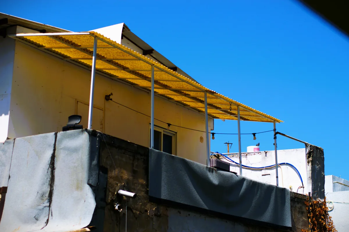IWD Miami estimator performing on-site assessment for pergola installation project