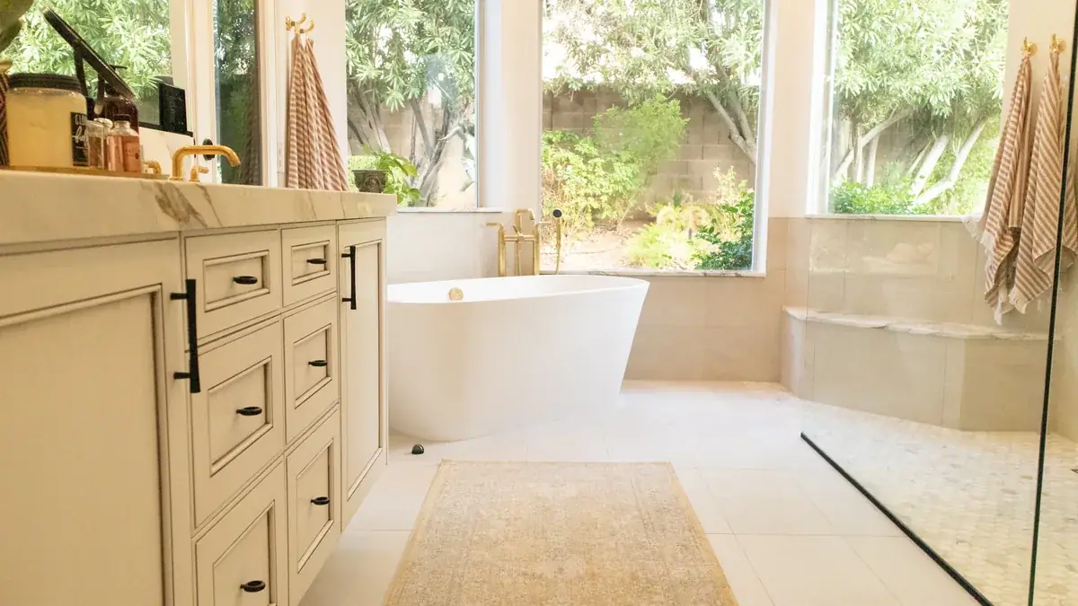 IWD Miami estimator performing on-site assessment for bathroom plumbing project