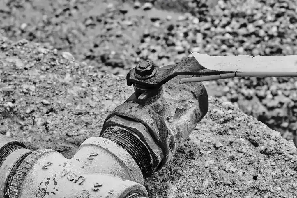 Master plumber installing faucet repair equipment in a Florida home