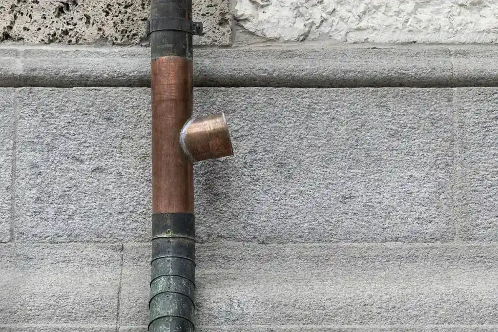 Master plumber installing gas line repair equipment in a Florida home