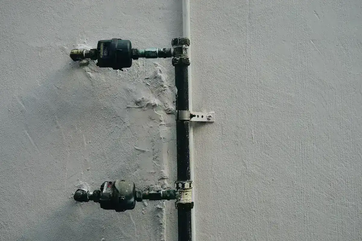 Master plumber installing gas line services equipment in a Florida home
