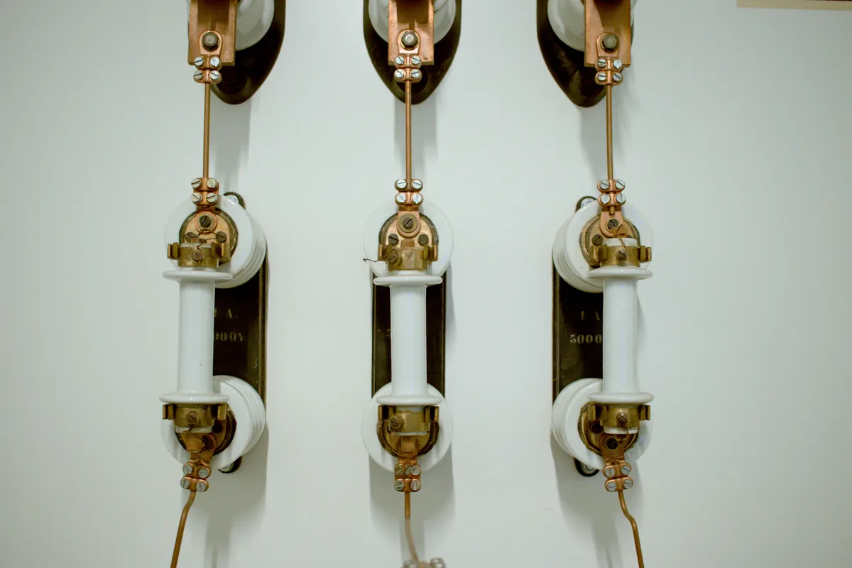 Master plumber installing pipe repair equipment in a Florida home