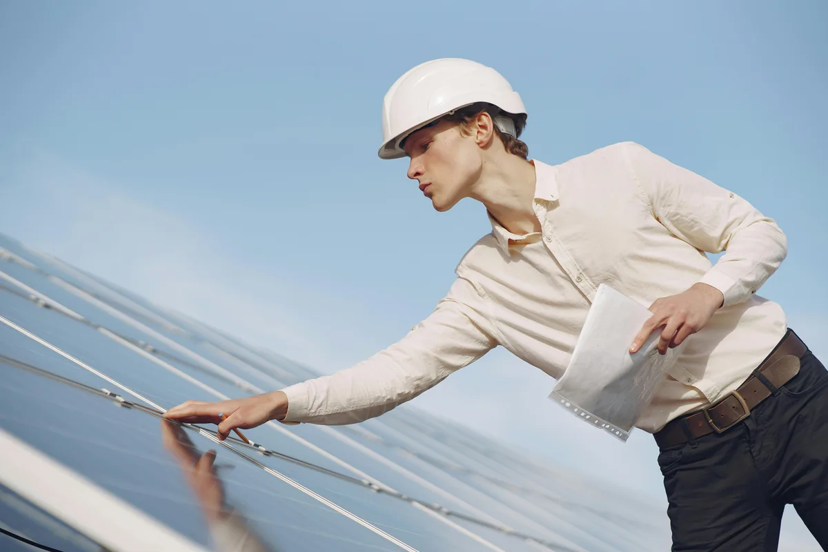 IWD Miami estimator performing on-site assessment for cedar shake siding project
