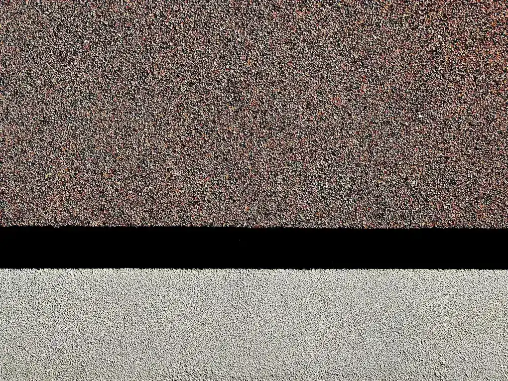 Roofer installing architectural shingles on a Florida home