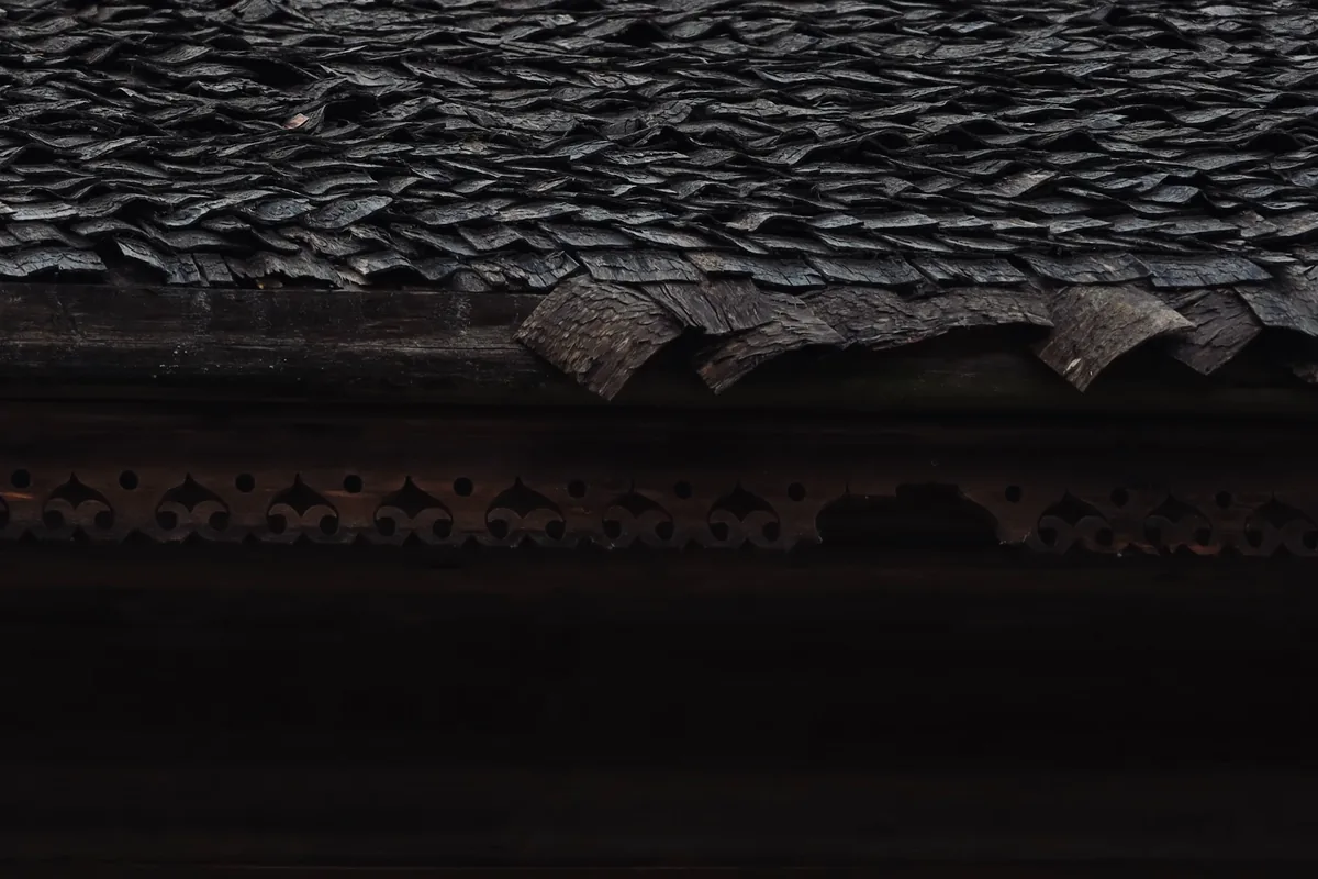Roofer installing architectural shingles on a Florida home