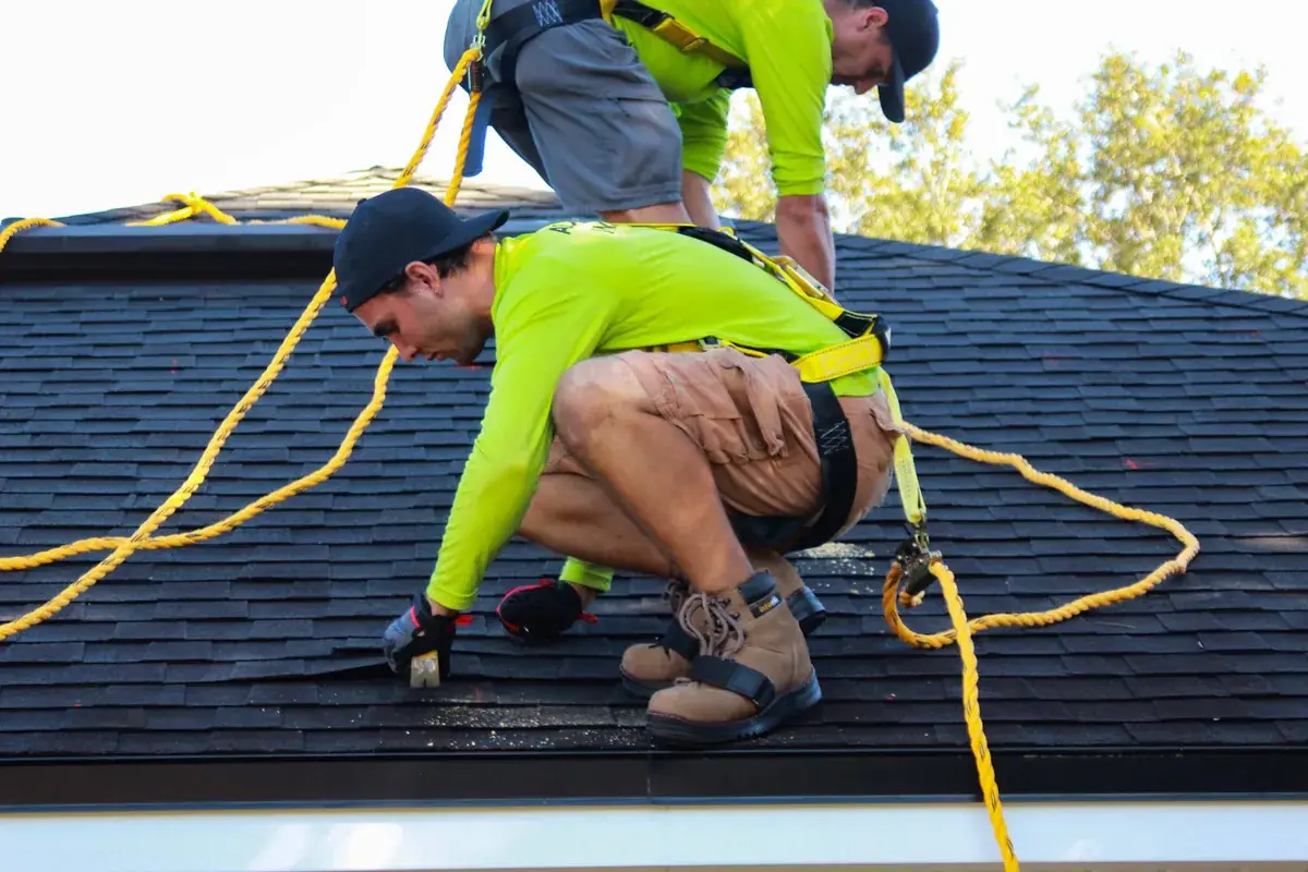 IWD Miami estimator performing on-site assessment for roof repair project
