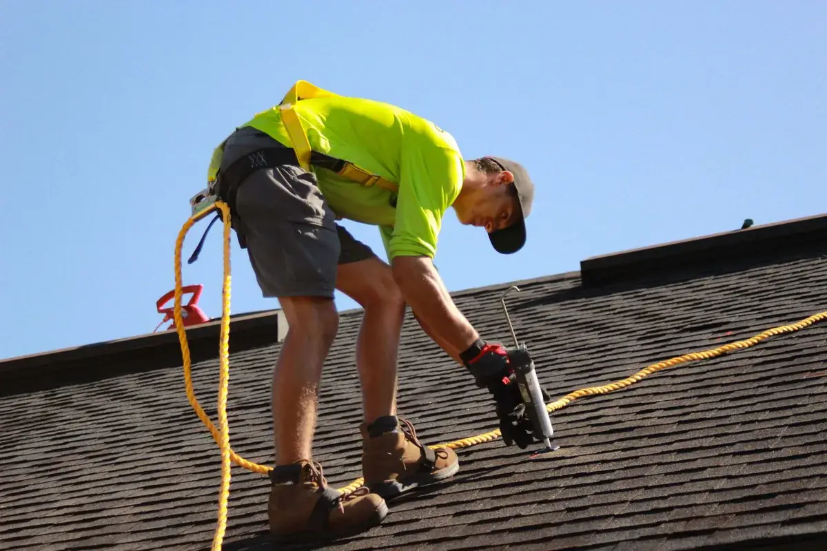 IWD Miami estimator performing on-site assessment for roof replacement project