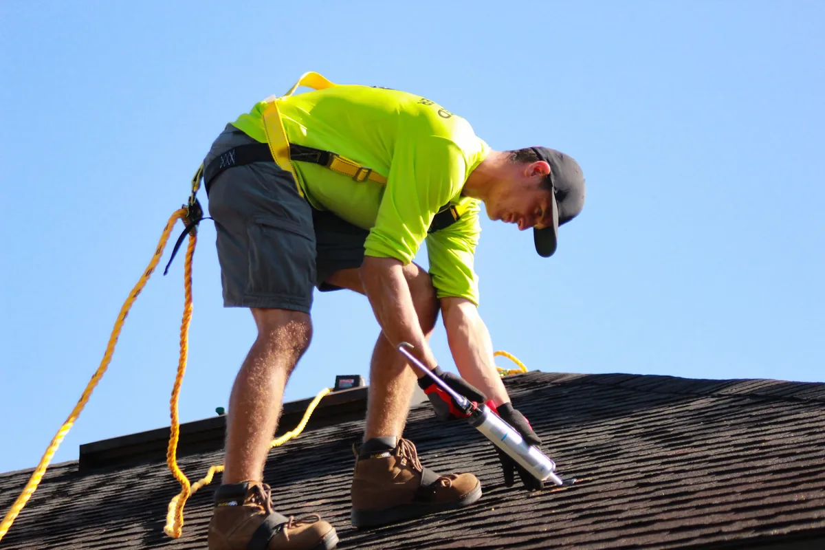 IWD Miami estimator performing on-site assessment for storm damage repair project