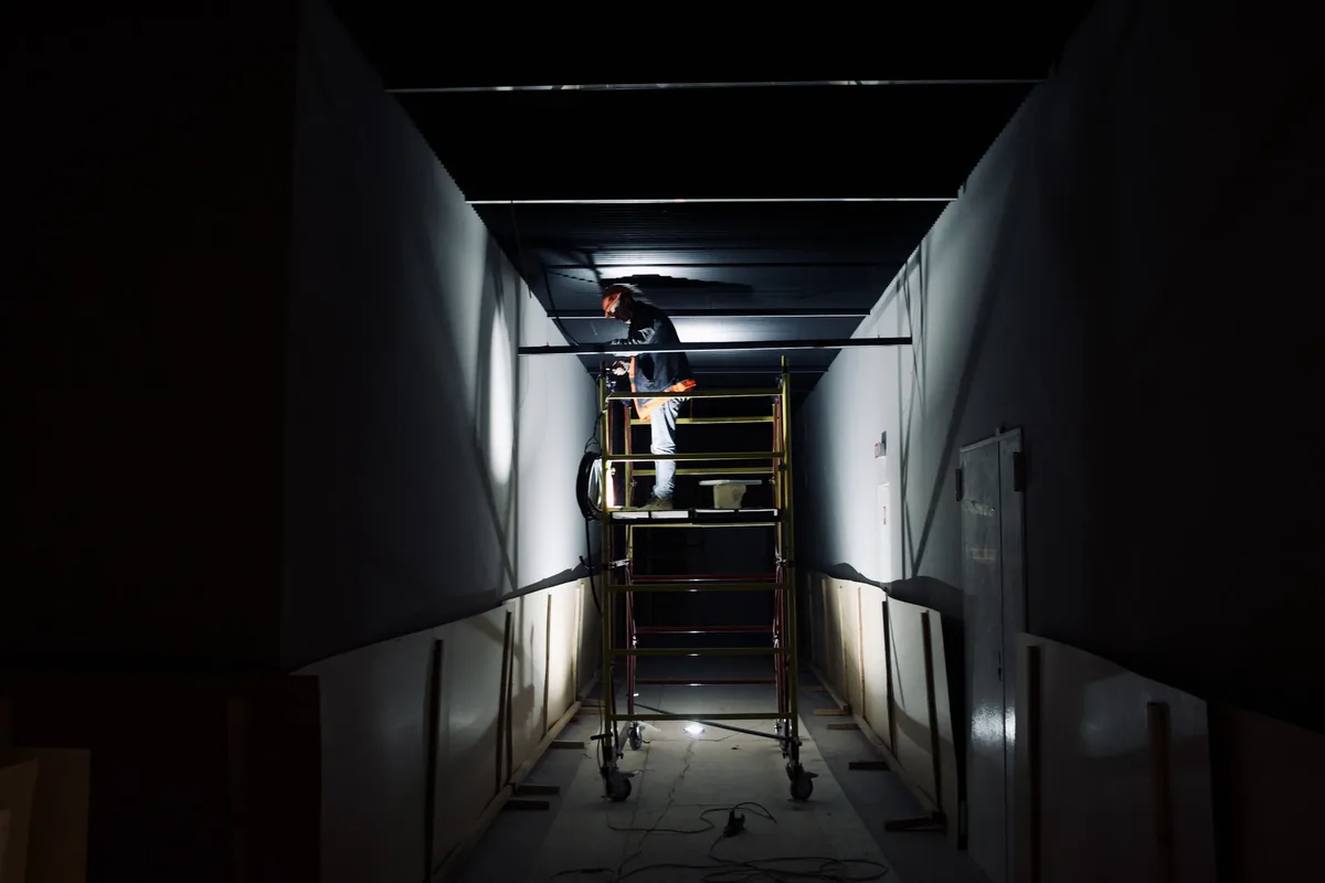 IWD Miami estimator performing on-site assessment for tile installation project