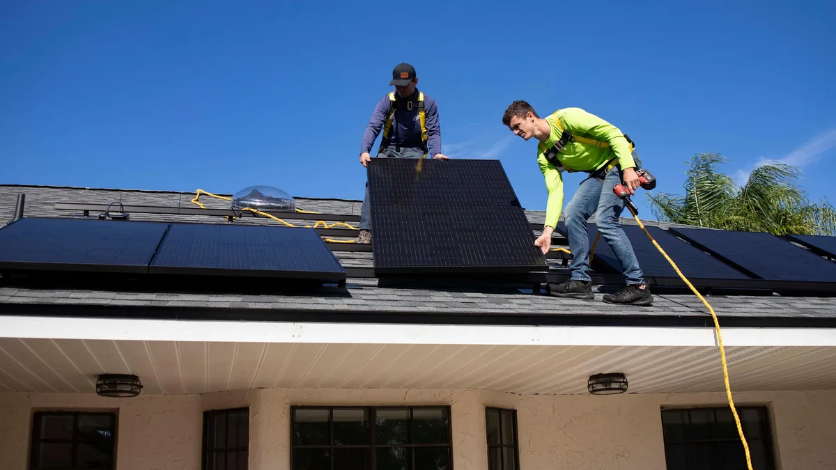 IWD Miami estimator performing on-site assessment for air sealing project