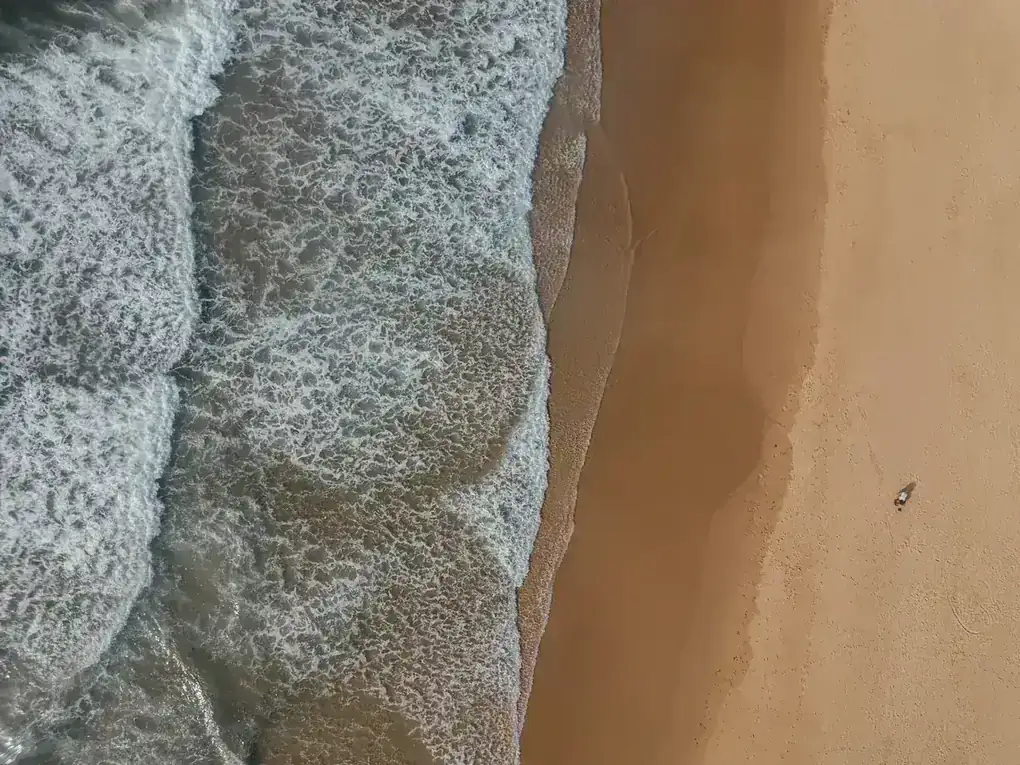 BPI-certified analyst performing spray foam insulation on a Florida home